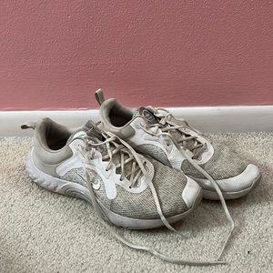 White Nike Renew Running Shoes